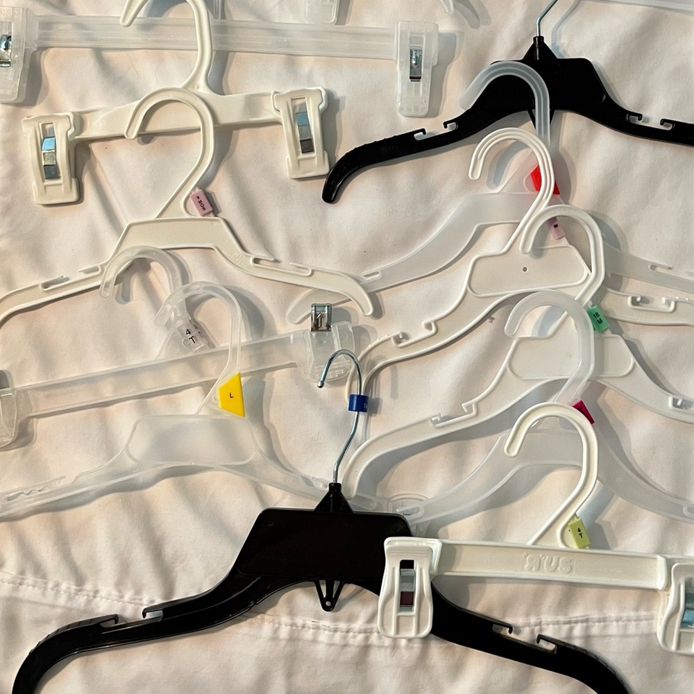 Gently used toddler/little kid plastic hanger 10 pant/ 10 skirt hangers